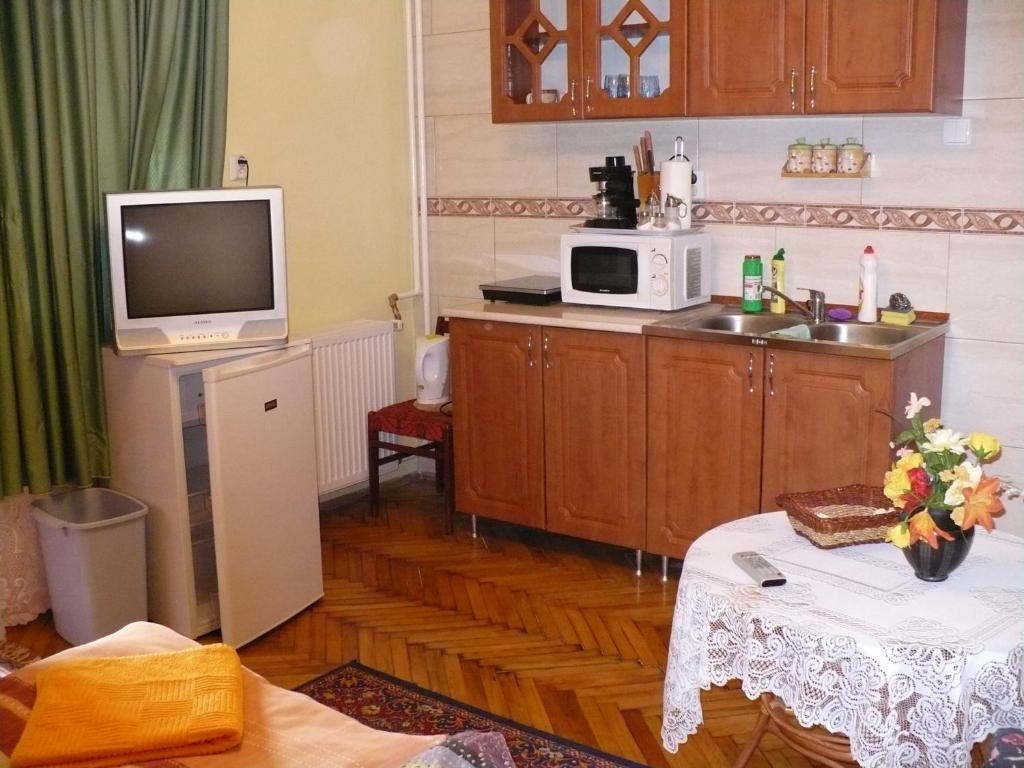 Апартаменты Kitty Apartman Мишкольц Номер фото